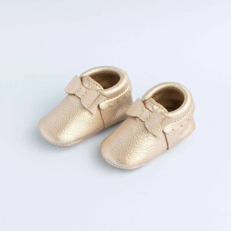 Freshly Picked | Bow Mini Sole Moccs ~ Platinum Gold Size 6